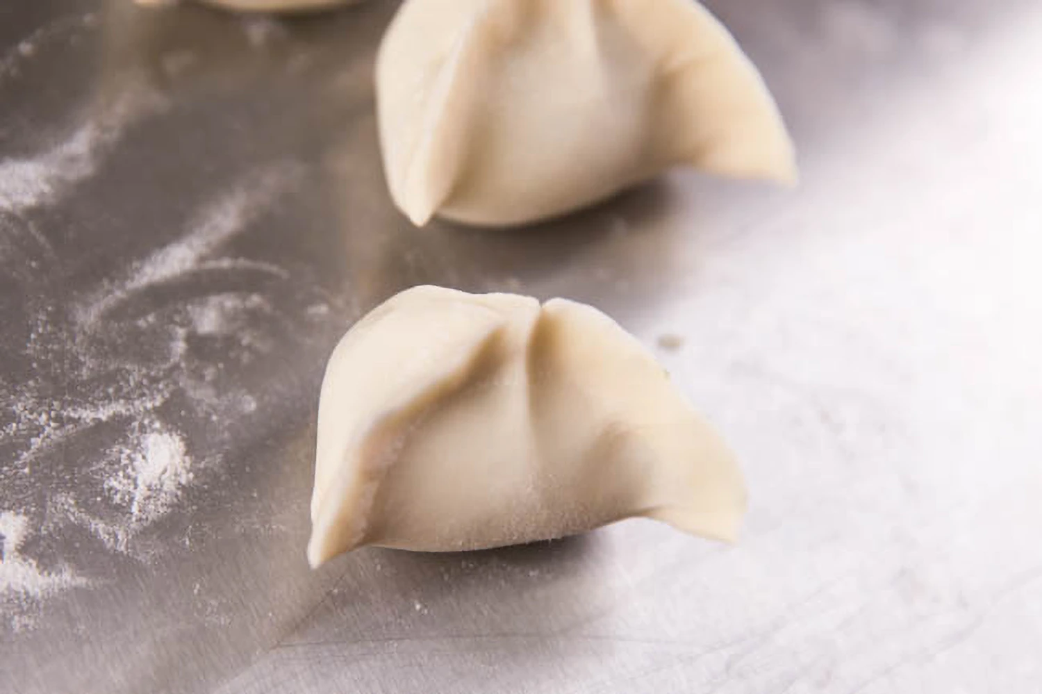 How to Fold Dumplings|chinasichuanfood.com